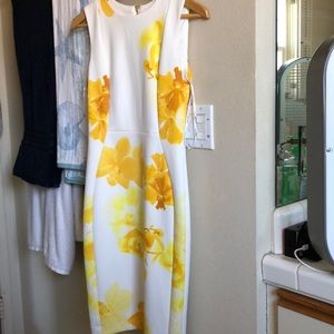 White Calvin Klein body con dress with flowers